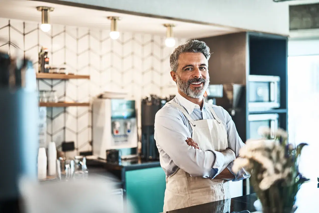 Empowered businessman inside his restaurant